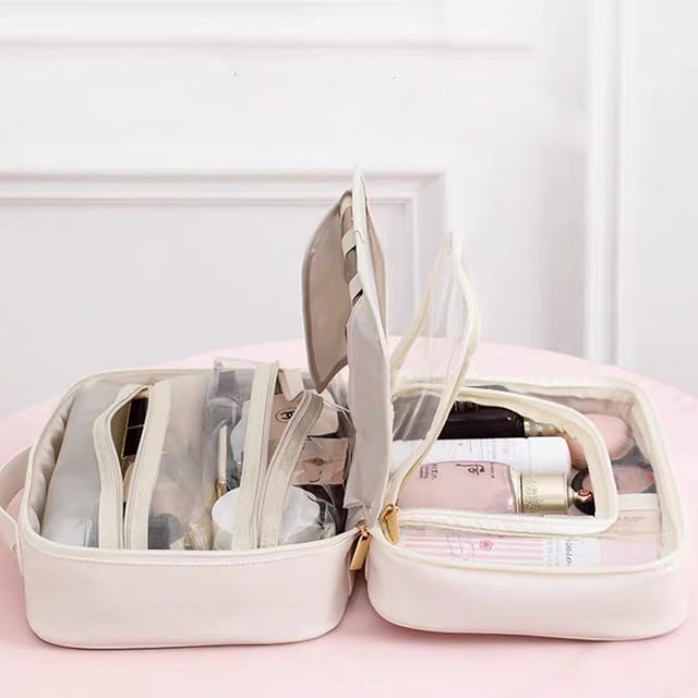 Cosmetic bag with transparent compartments