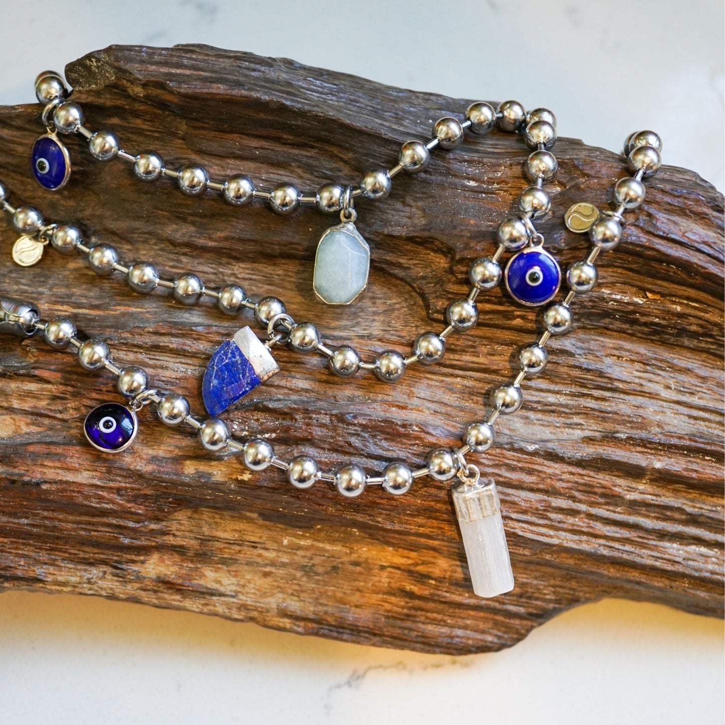 Silver Charm Bracelet with Selenite & Blue Evil Eye