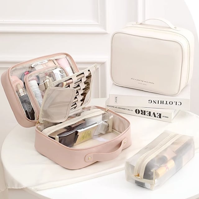 Cosmetic bag with transparent compartments